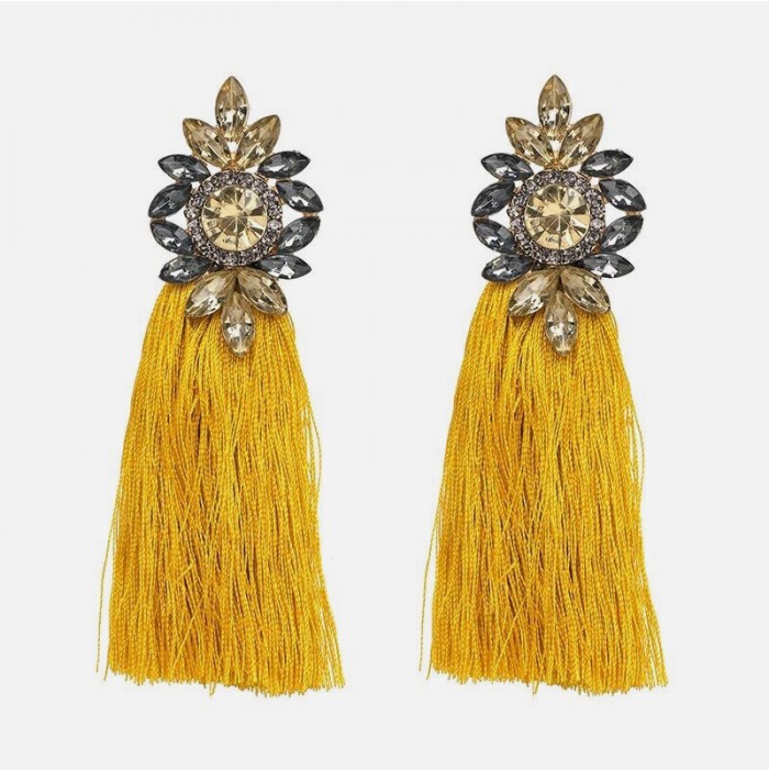 Rhinestone earrings and yellow pompom