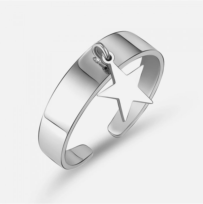 Ring with star pendant