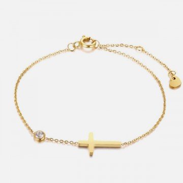 Golden cross and zircon bracelet