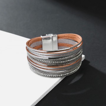 Leather cuff with silver chains and rhinestones