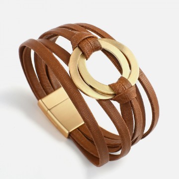 Brown leather cuff with gold rings 1