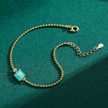 Silbernes Armband mit türkisfarbenem Prinzessinnen-Zirkon in Goldfarbe 1
