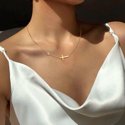 Gold cross and zircon necklace and bracelet set