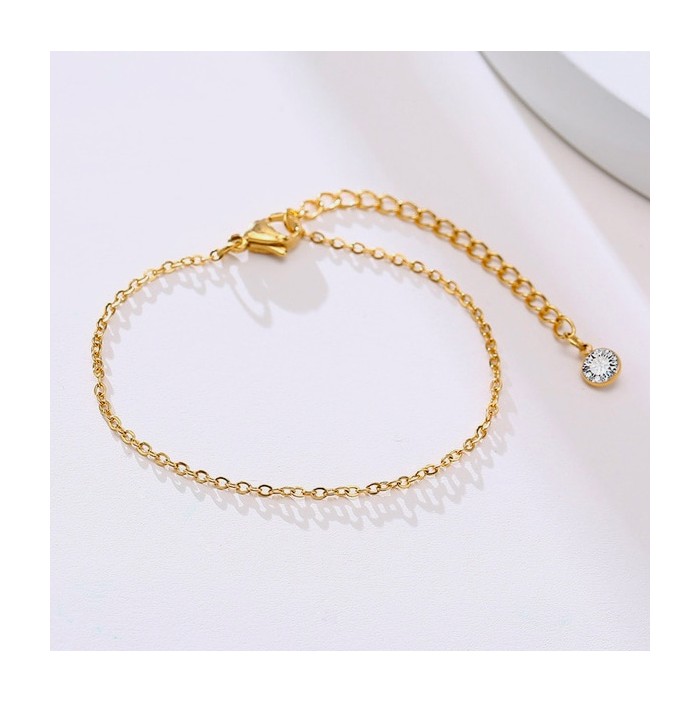 Fine gold chain bracelet and zirconia