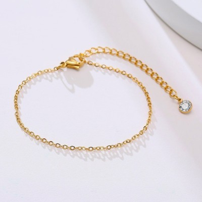 Fine gold chain bracelet and zirconia