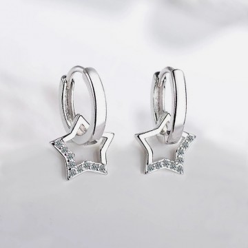Small silver hoop earrings and zircon star