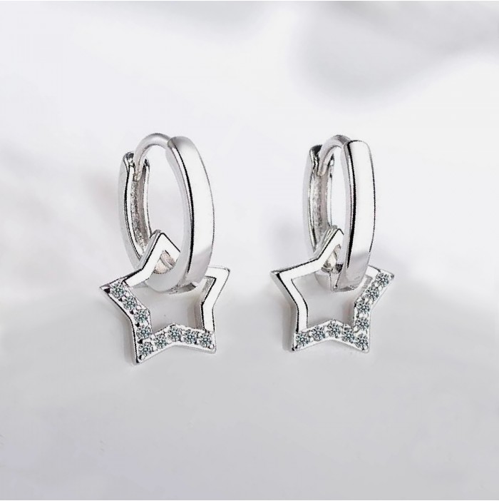 Small silver hoop earrings and zircon star