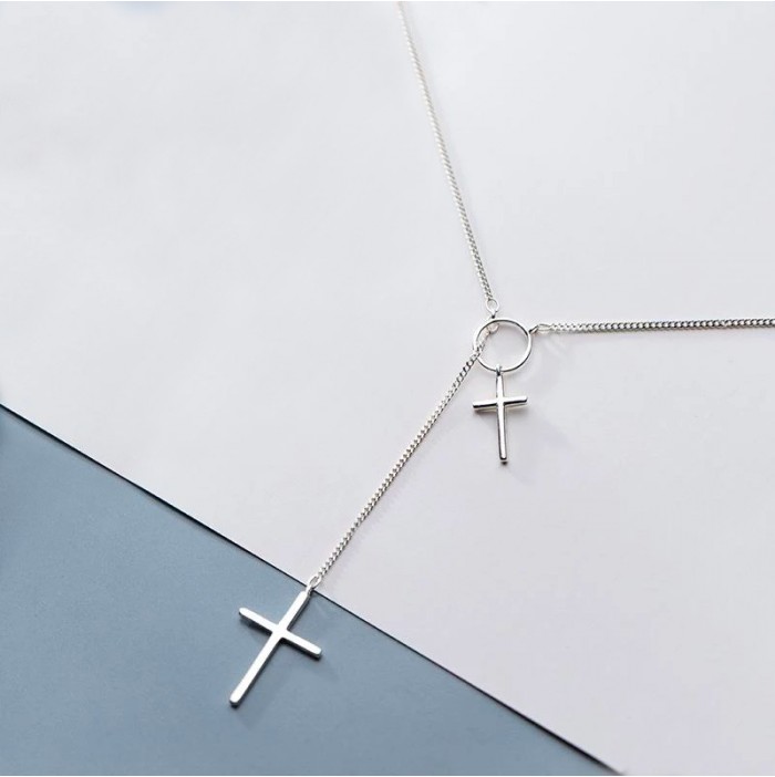 Silver necklace with 2 intertwined crosses