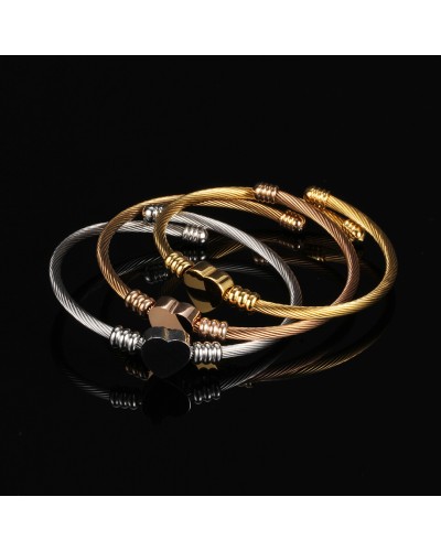 Golden braided steel heart bracelet