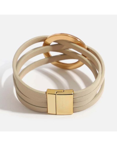Beige leather cuff with gold rings
