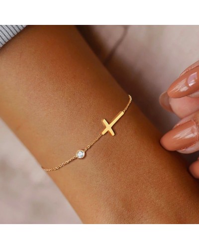Golden cross and zircon bracelet 1