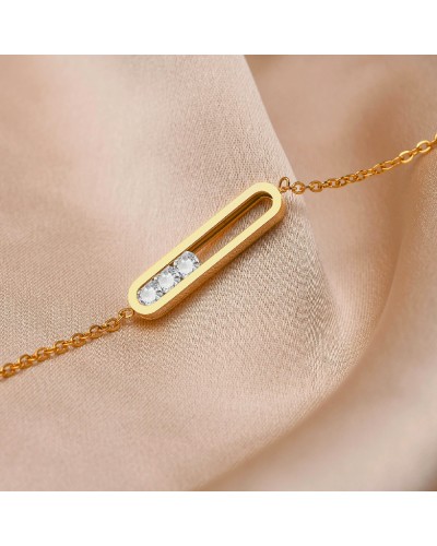 Gold bracelet with 3 rail-set mobile zircons