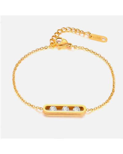 Gold bracelet with 3 rail-set mobile zircons