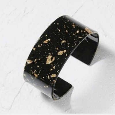 Black and gold resin cuff